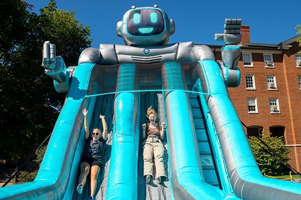 Students enjoy inflatables on South Beach.